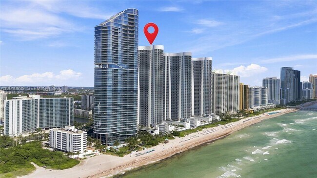 Building Photo - 15811 Collins Ave