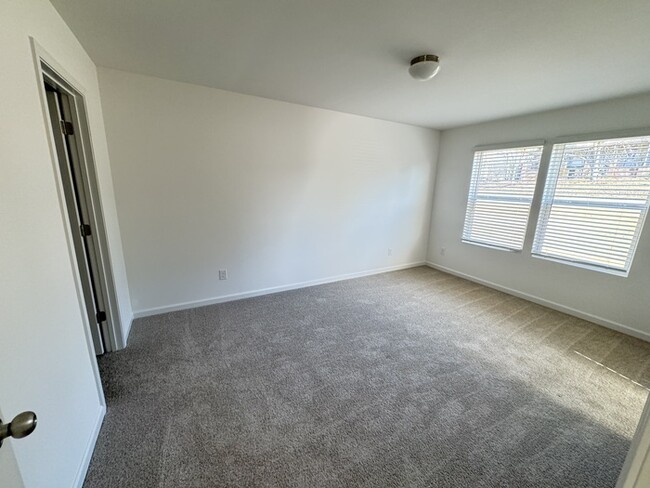 Building Photo - Brand new three bedroom 2 1/2 bath townhom...