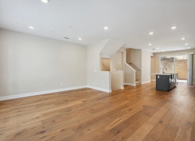 Building Photo - Tucked within the Hollywood Hills in a gated community