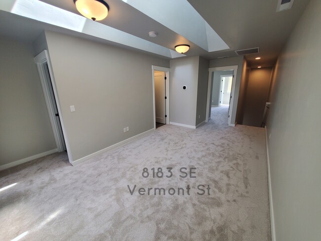 Loft open area with skylight - 8183 SE Vermont St