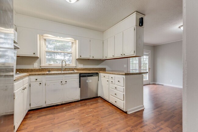 Building Photo - Spacious 3-Bedroom Home with Finished Base...