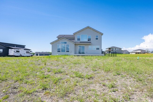 Building Photo - Premium 4BR Rental in The Ranch | Stunning Mountain Views | Easy Community Location | Automatic G...