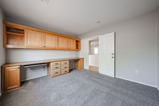 Building Photo - Introducing a stunning 4-bedroom, 2.5-bath...