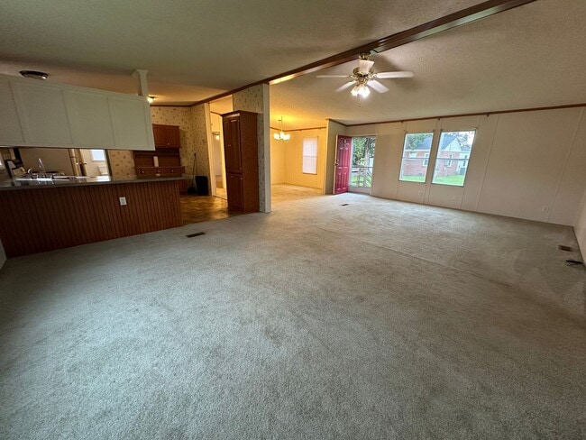 Building Photo - Charm & Commuter Convenience – 3BR/2BA Outside City Limits