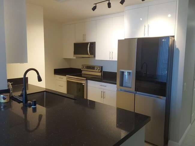Building Photo - Stunningly Remodeled Studio High-Rise Unit...