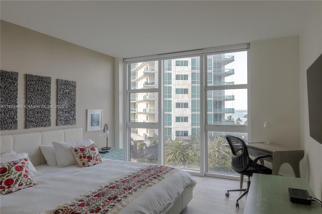 Building Photo - 10275 Collins Ave