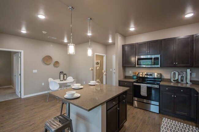 Building Photo - Spacious 1-bedroom, 1.5 bath, 1st floor, with elevated deck, available 05/19/2026