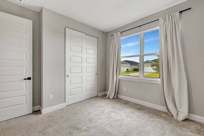 Building Photo - 8606 Dahlia Cir