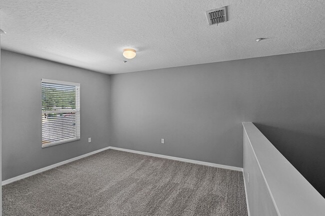 Building Photo - 2/2.5/2 Plus Loft in Gated Winter Garden C...