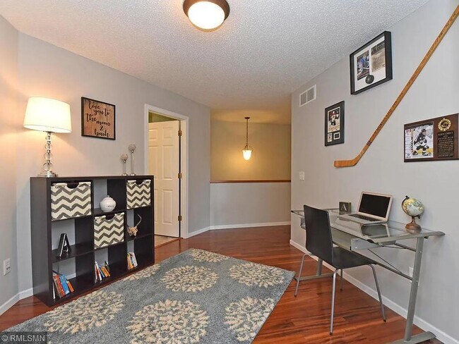 Building Photo - 3 Bedrooms | Loft | Upper-Level Laundry | 3-Sided Fireplace | Woodbury