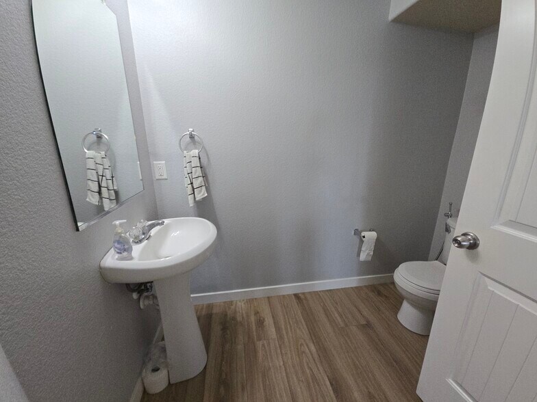 Half bath downstairs - new flooring - 10116 Deer Chase Trl
