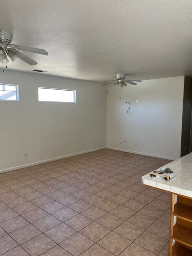 Building Photo - 4 Bedroom, 2 Bathroom Home with a Pool in ...