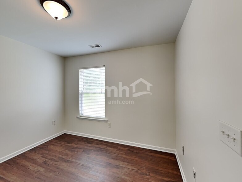 Building Photo - 8127 Deodora Cedar Ln