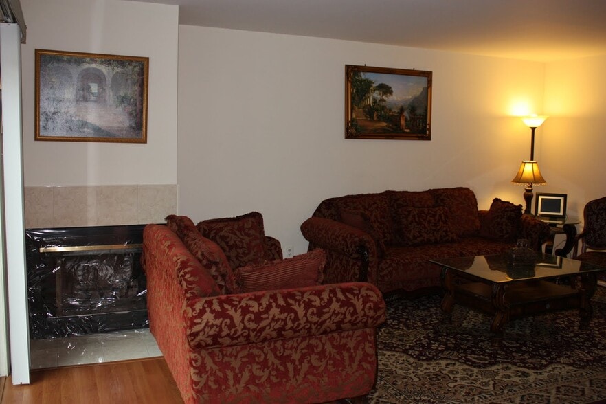 Wood Burning Fireplace in the Living Room - 44 Whitby Cir