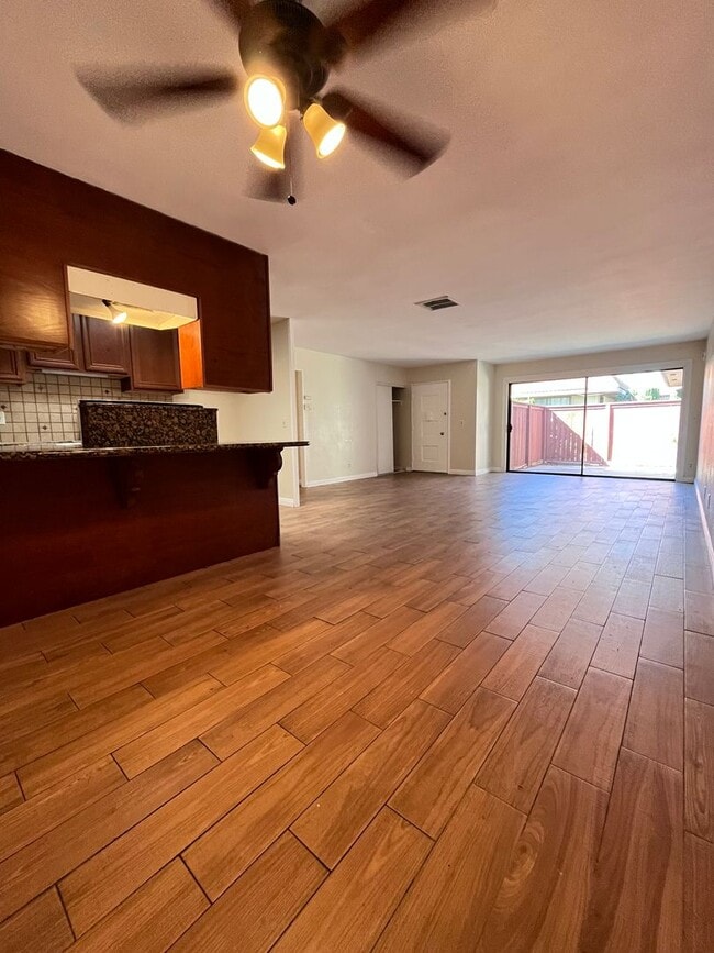 Building Photo - SINGLE STORY 3 BR/ 2 HOME WITH 2 CAR GARAGE