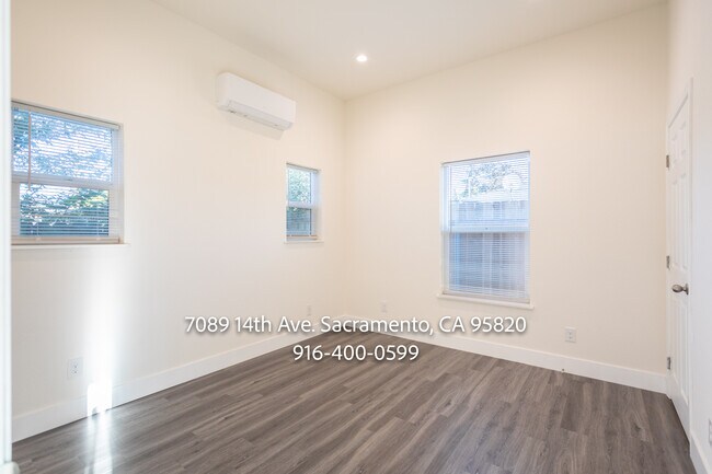 Building Photo - 7089 14th Ave