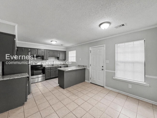 Building Photo - 10005 Riggan Dr