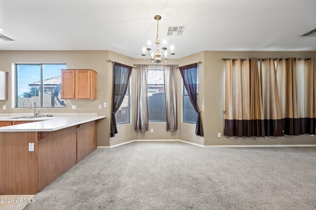 Building Photo - 10870 W Chase Ln