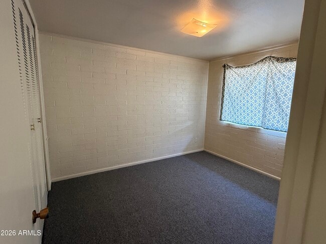 Building Photo - 12235 N Cherry Hills Dr W