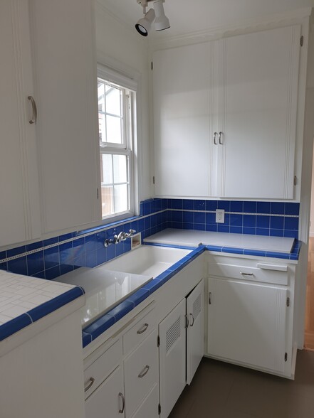 Original cabinets and quartz countertops - 2567 Land Park Dr