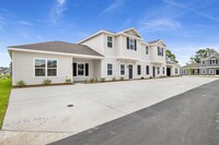 Building Photo - Cottages at Wyld Palms