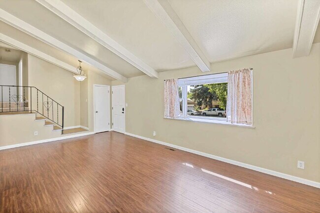 Building Photo - 3-Bedroom with A Flex Room Multi-Level Home with Fresh Paint, Refreshed Deck, and Multiple Living...