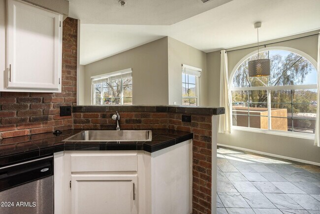 Building Photo - 9451 E Becker Ln