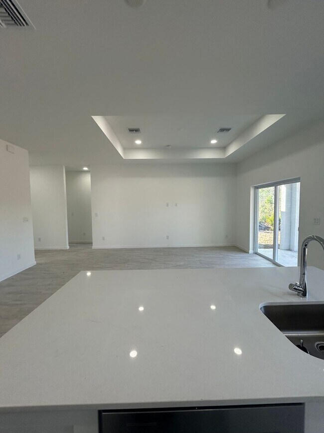 Building Photo - Brand-New & Modern! 4/2/2 Home in Desirable SW Lehigh Acres