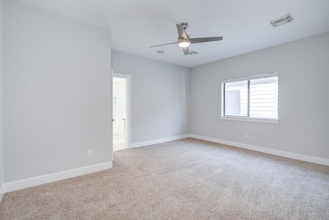 Spacious master bedroom large enough to fit a King bed. - 4202 Spencer St