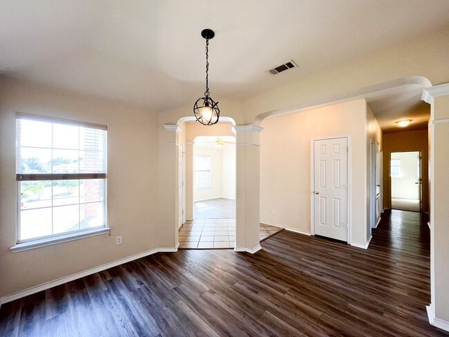 Building Photo - Available Now Beautiful 1 story, 4 bedroom, 2 bath, 2 car garage home with fire place, garage doo...