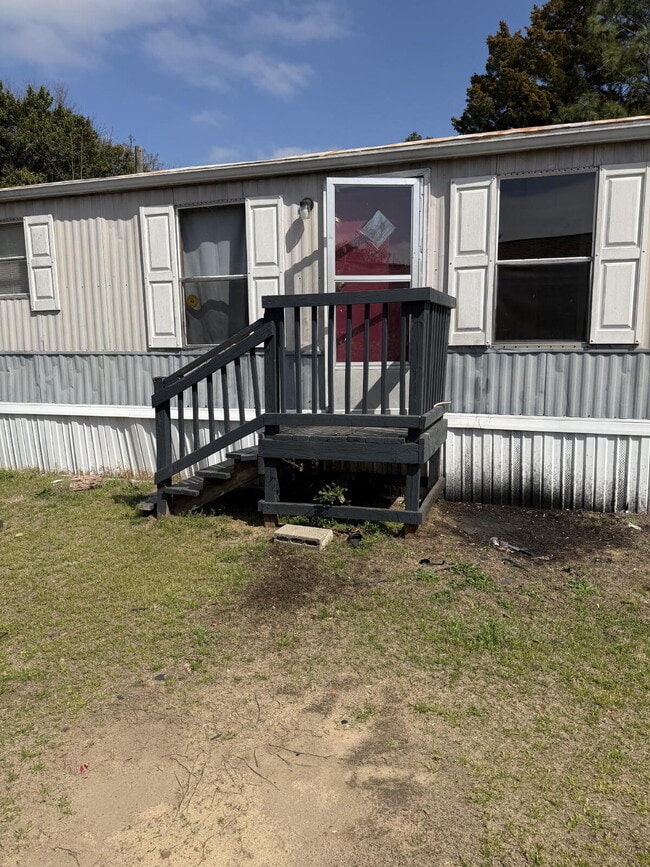 Building Photo - Handyman Special – Land + Home (Rent-to-Own)