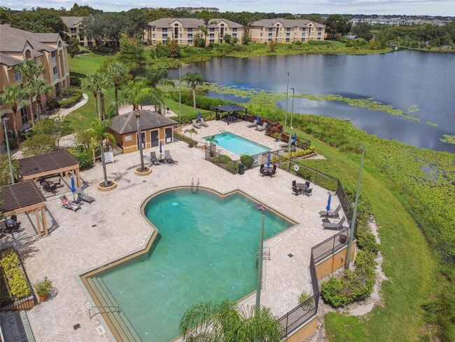 Building Photo - Seurat Street, Orlando, FL 32819 - 4 BR 2 BA condo