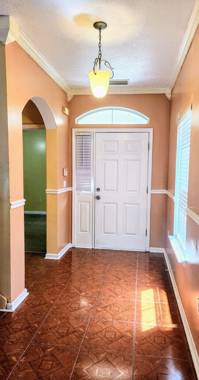 Building Photo - Spacious 4BR w/ Fenced Yard + Covered Lanai + 2 Car Garage  in Orange Park!