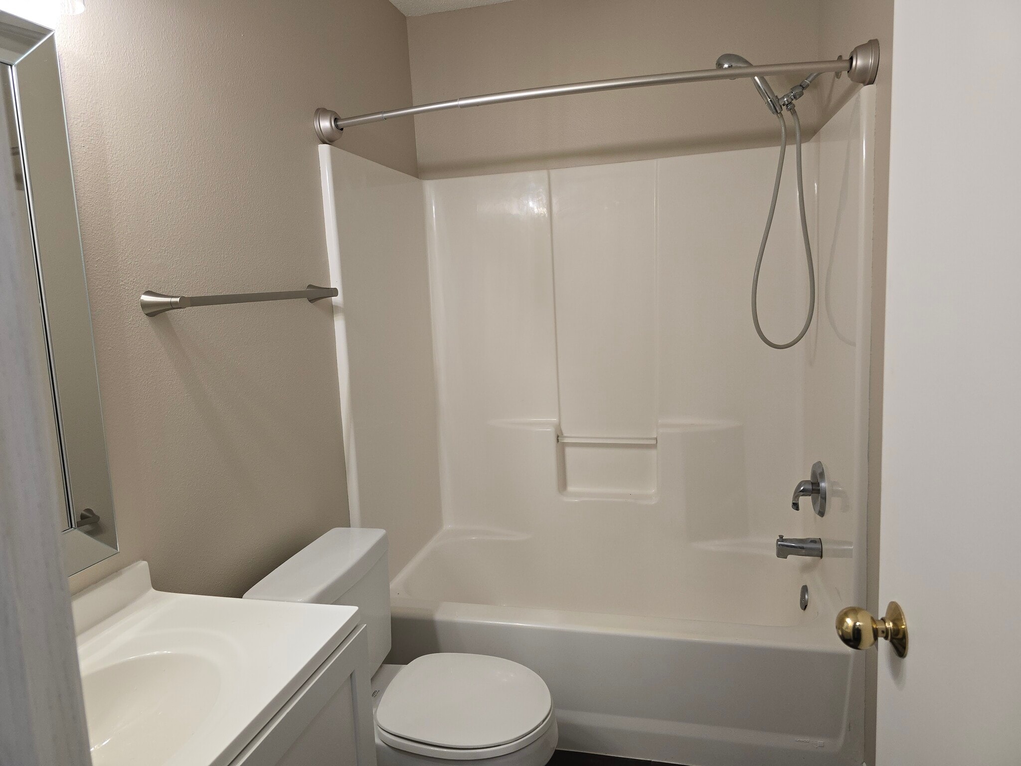 Basement vanity w/ curved shower rod - 994 38 1/2 Ave W