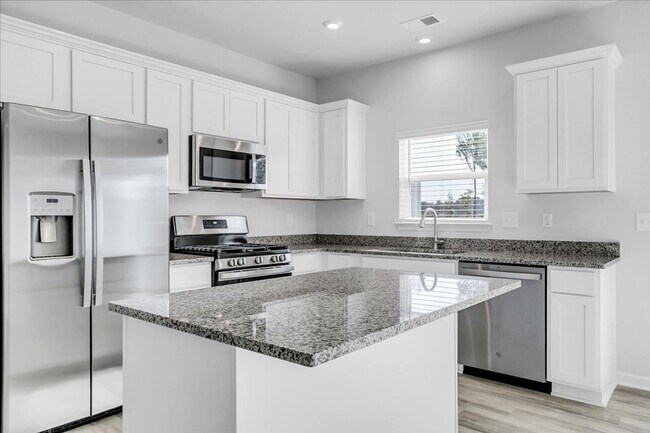 Building Photo - AVAILABLE NOW! Brand New 3-Bedroom Townhou...