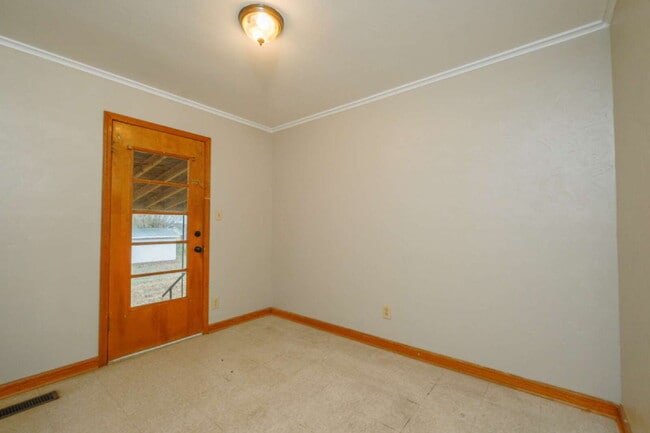 Building Photo - "Charming 3-Bedroom Greenfield Home with Gleaming Hardwood Floors – 1256 Sq Ft of Cozy Comfort!"