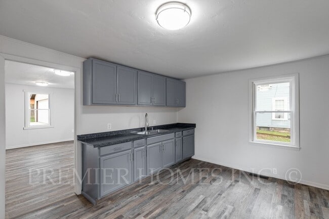 Building Photo - 3 Bed Home with Basement & Off-Street Parking – $1,395/mo