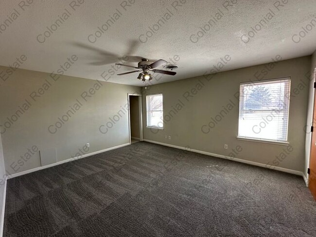 Building Photo - Spacious 4 bedrooms 2 bathrooms home