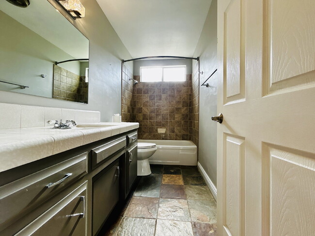 Building Photo - Spacious 2 bd, 2 ba with attached finished garage