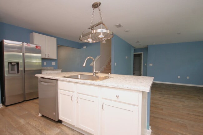 Building Photo - Spacious 5-Bedroom Home Near NAS with Move...