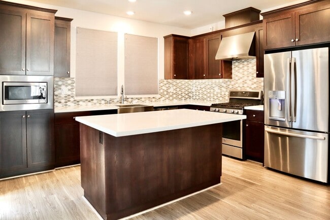 Building Photo - Gorgeous 3-story Townhome Available for Re...