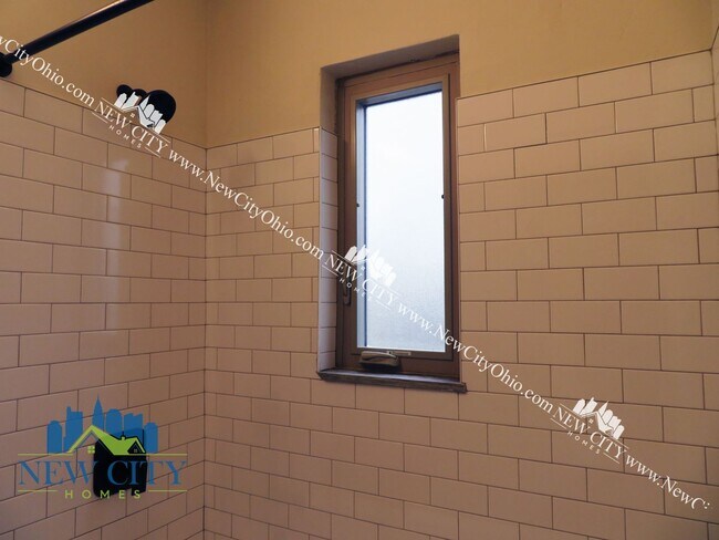 Building Photo - Newly Renovated Apartment Building