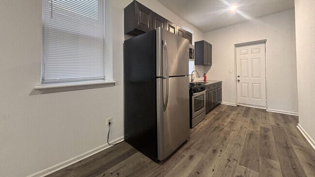 Building Photo - Modern Four-Bedroom Row Home in Kingsessing