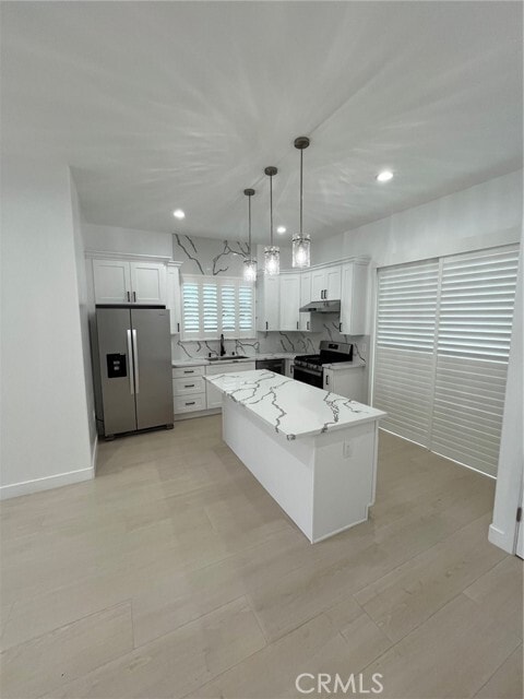 Building Photo - 8684 Oasis Ave