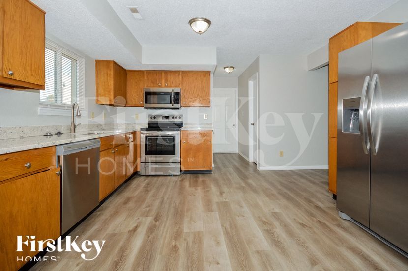 Building Photo - 6344 River Valley Way