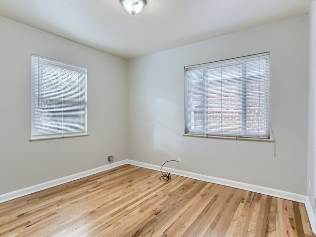 Building Photo - Evolve Real Estate: Available 8/8/26 Brick Tudor with Large Yard and Finished Basement!