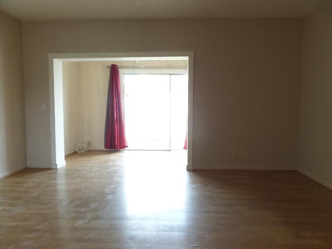 Building Photo - 8633 Pluto Terrace