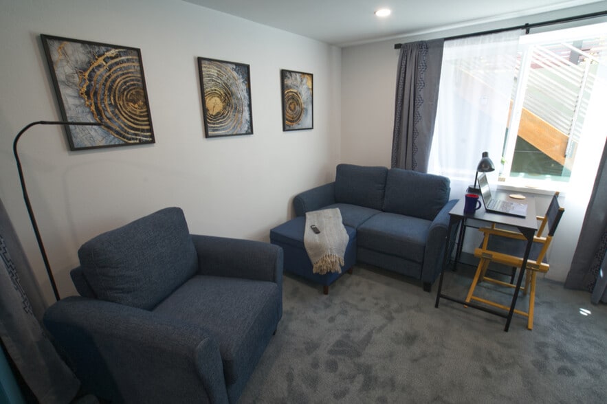conversation area and its own TV - 4157 SE Brooklyn St