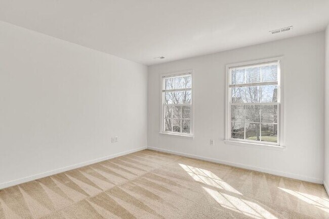 Building Photo - Spacious 5 Bedroom Home with 3rd Floor Suite, Fenced Yard & Community Amenities – $3,500/mo