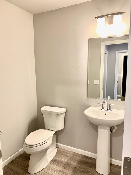 Main level powder room - 5514 Spring Tide Way